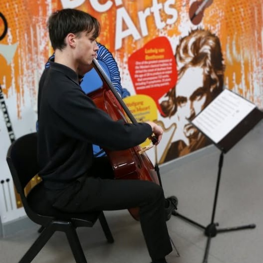 Y11 Meadowhead student is playing the cello 